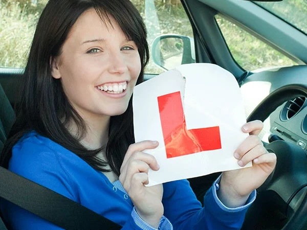 woman-is-holding--learning-driving-license